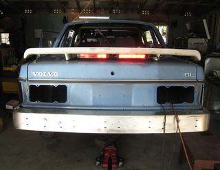 Illustration for article titled What Makes A Race Car Faster? A Fiero Wing, Of Course!